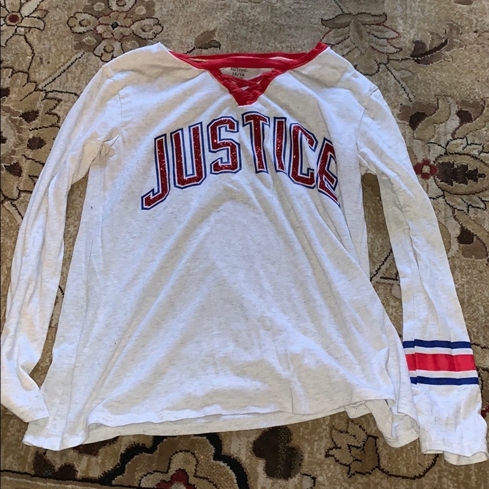 A gray justice shirt.